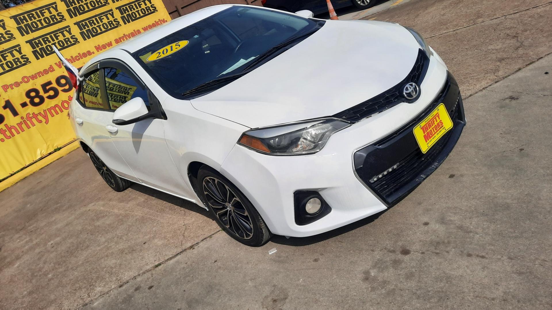 2015 Toyota Corolla (2T1BURHE8FC) , located at 16710 Clay Rd., Houston, TX, 77084, (281) 859-7900, 29.834864, -95.656166 - Photo#2